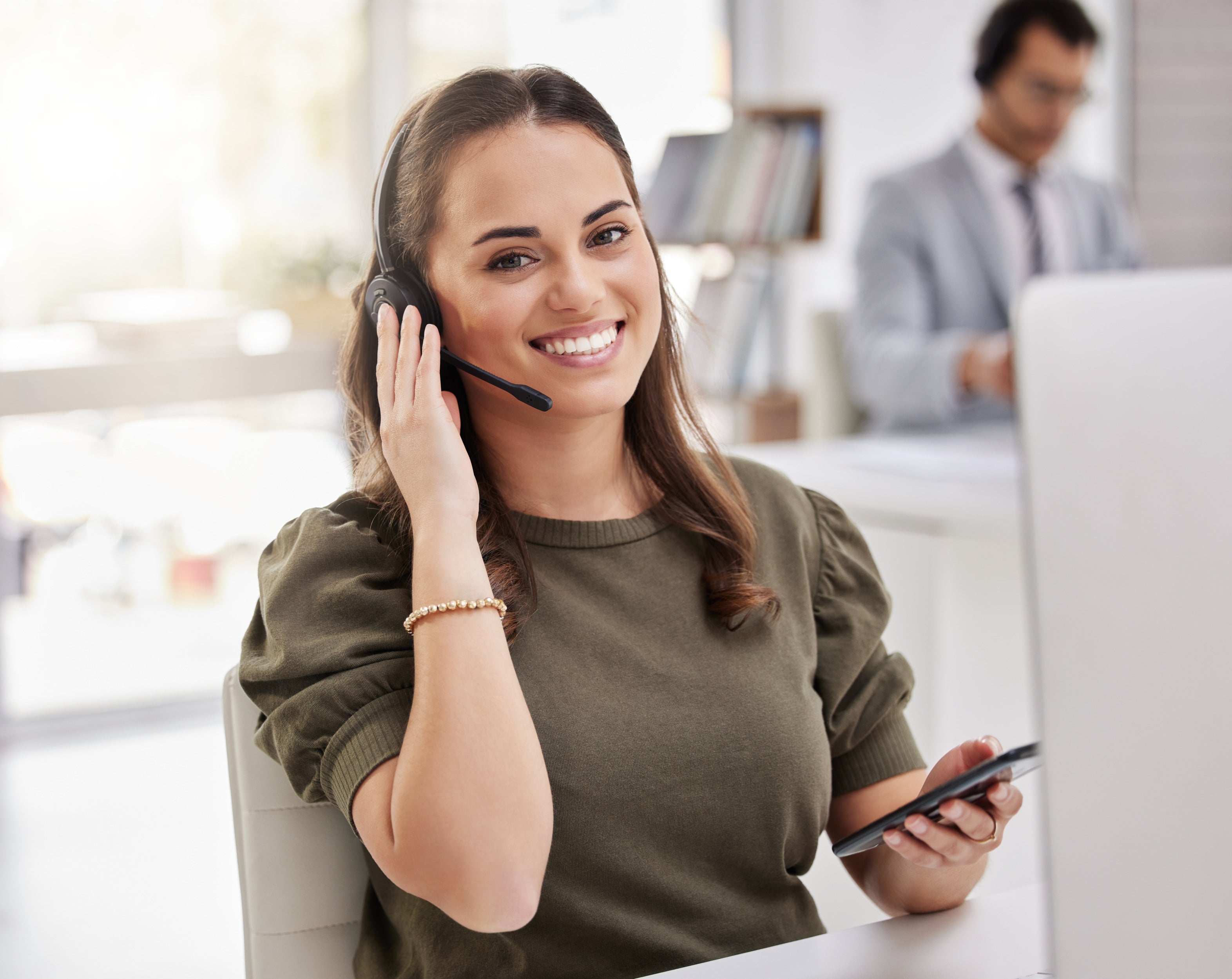 woman-typing-online-with-smartphone-call-center-technical-support-agent-relax-desk-happy-consultant-contact-us-telecom-customer-care-advice-virtual-feedback-with-tech.jpg